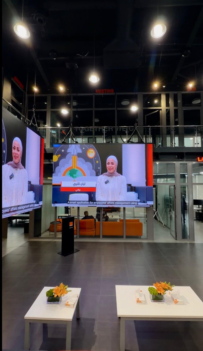 Layan Tellawi presenting Dawami on the big screens at Orange Jordan